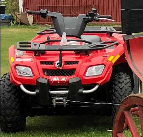 Röd Can Am fyrhjuling stulen ur garage vid nya kyrkogården i Vittangi
